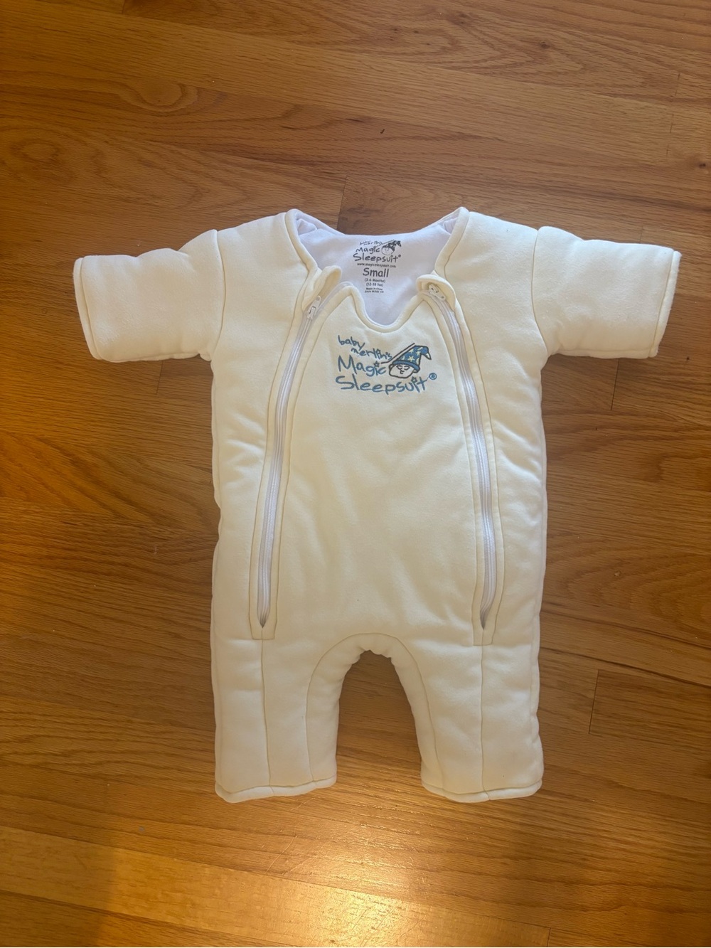 Baby Merlin’s Magic Sleepsuit Size Small (3-6 months) Cream color